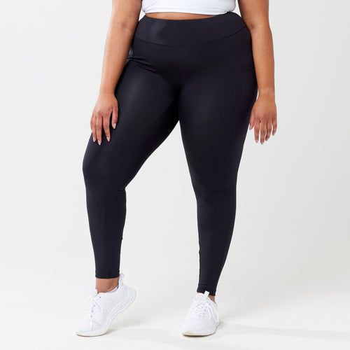 Plus model wearing black leggings for use in active lifestyles as well as casual living.