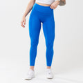 Model wearing cobalt leggings for use in active lifestyles as well as casual living.