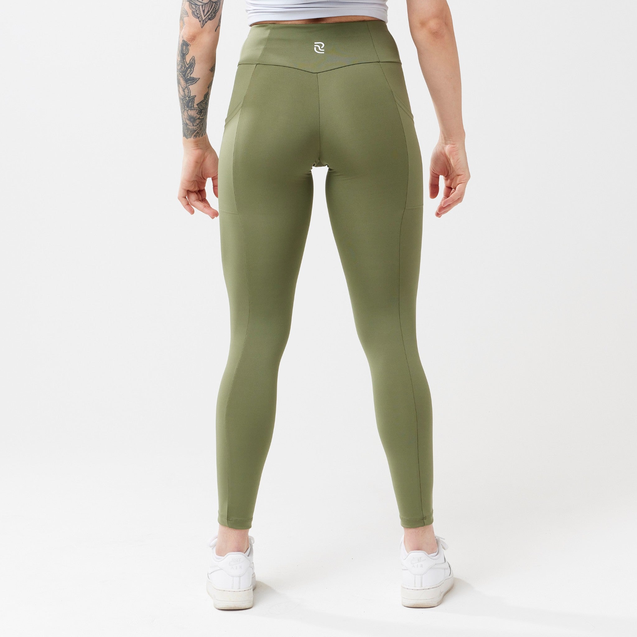 Model wearing sagewood leggings for use in active lifestyles as well as casual living.