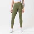 Model wearing sagewood leggings for use in active lifestyles as well as casual living.