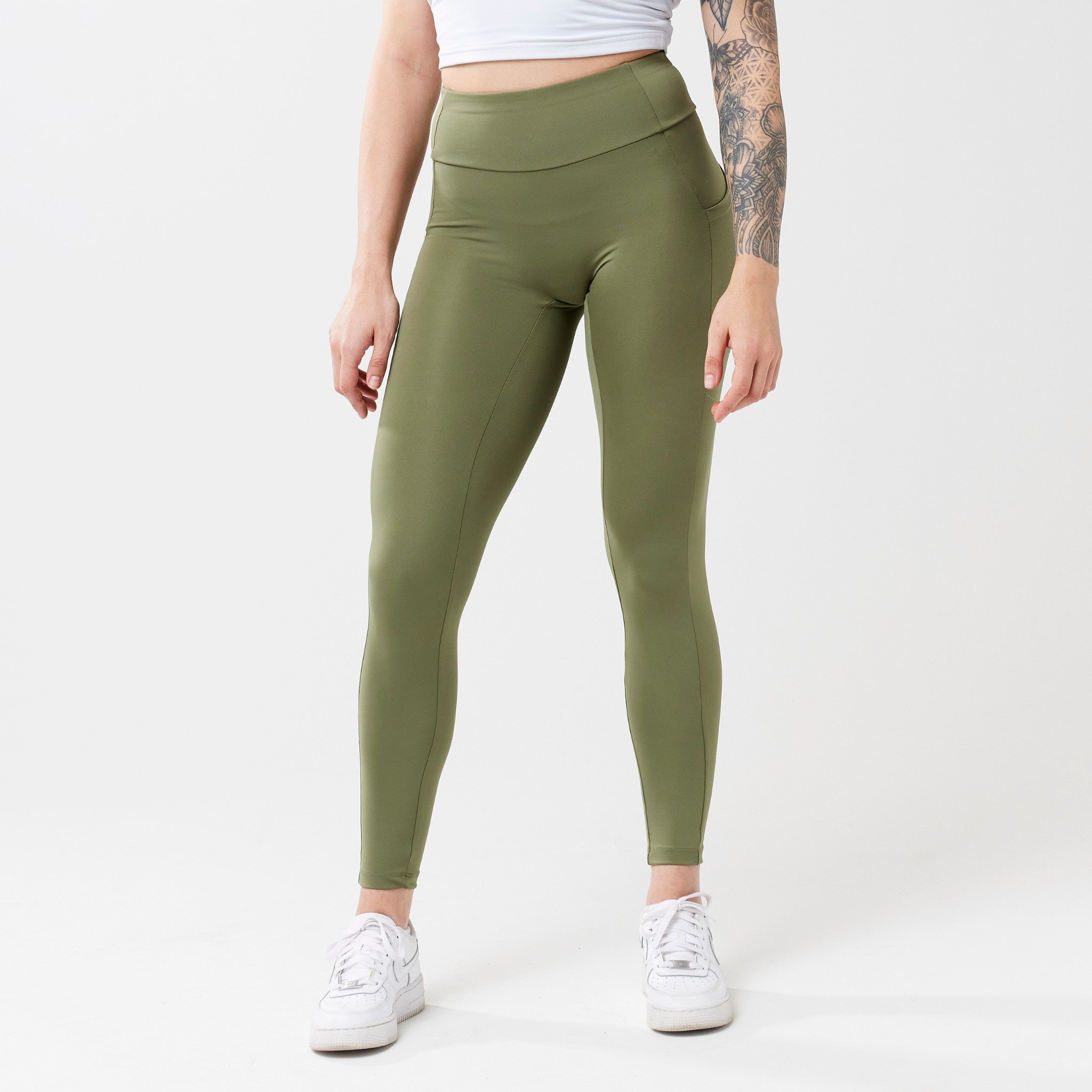 Model wearing sagewood leggings for use in active lifestyles as well as casual living.