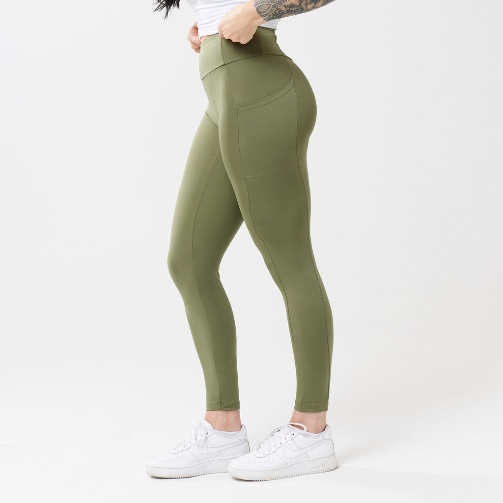 Model wearing sagewood leggings for use in active lifestyles as well as casual living.